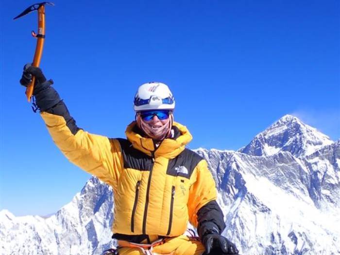Mountaineer Allie Pepper Summits a mountain in the Himalayas