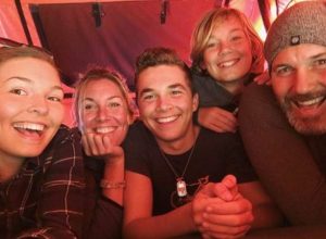 Carol van Stralen and family in a tent
