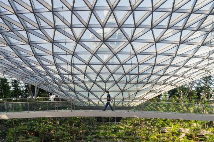 A man walks near the The Jewel at Changi International Airport.