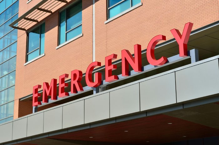 An emergency department sign on the exterior of the hospital. 