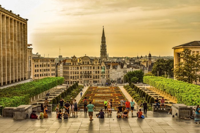 A grand city garden at sunset in Brussels, Belgium.