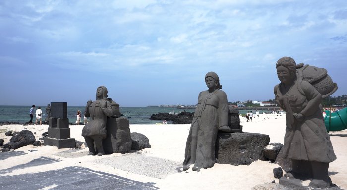 Statues on the beach at Jeju Island, South Korea.