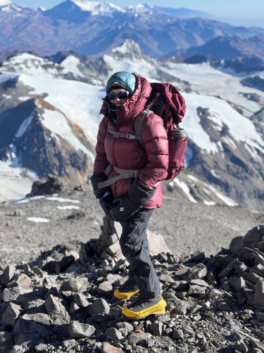 Nicole Lynch, a mountain climber, poses for a photo on Aconcagua.