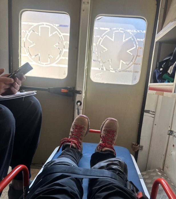 A patient's eye view of being on a stretcher in an ambulance on the way to the hospital. 