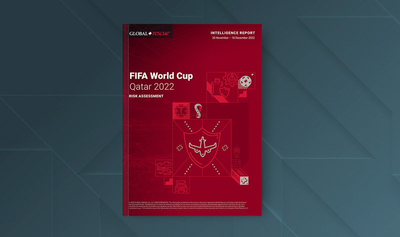 Global Rescue FIFA World Cup Risk Assesment report laying on blue surface