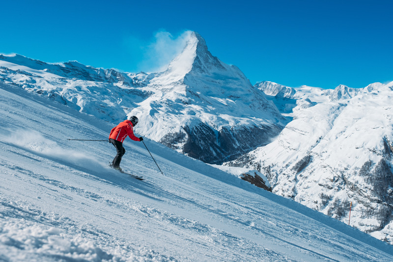 skiing in switzeland with Matterhorn in the background