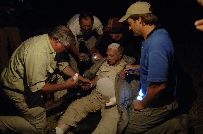 Medics attend to an injured man.